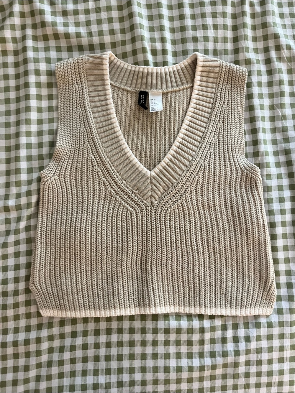 Beige sweater vest